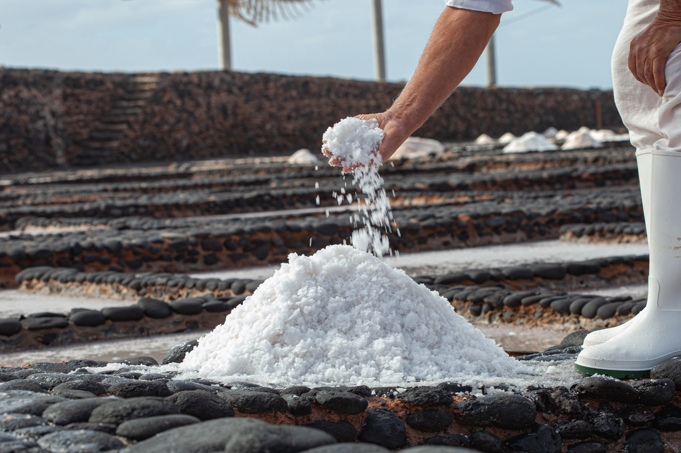 hand-picking-up-sea-salt